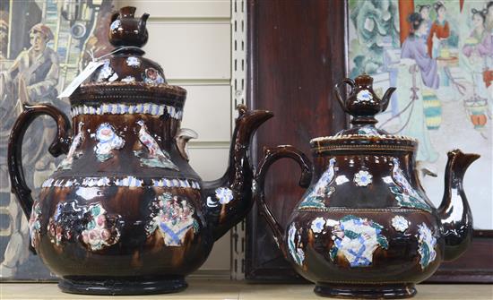 Two Measham pottery barge teapots